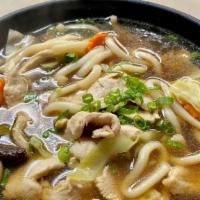 Japanese Udon Noodles · Udon noodles with chicken, napa cabbage, carrots, shiitake mushrooms, and scallions in dark ...
