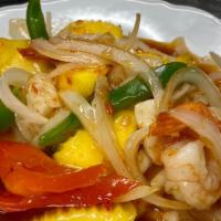 Mango Seafood Delight* · Shrimp, scallops, squid, mangos, bell peppers, and onions