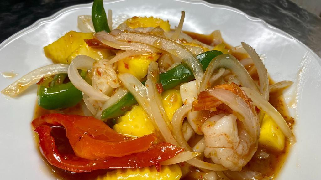 Mango Seafood Delight* · Shrimp, scallops, squid, mangos, bell peppers, and onions