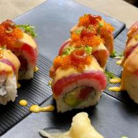 Volcano Maki* (Inside Out) · Spicy tuna, avocado, cucumber, topped with torched tuna, orange tobiko, scallions, spicy may...