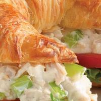 Chicken Salad Sandwich · Croissant with all white meat chicken salad, lettuce, and tomato. Served with choice of side.