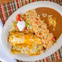 Chicken Enchiladas Pltr (2 Pc) · Ground beef, chicken or cheese. Served with Mexican rice, charra beans, pico de gallo and so...