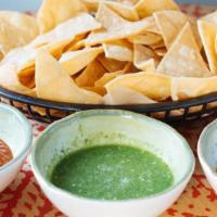 Tres Salsas · Roja, verde, and borracha. Served with corn tortilla chips.