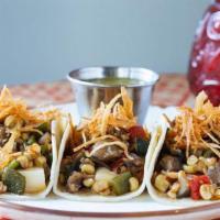 Vegetables Tacos · Eggplant, corn, poblano, and chihuahua cheese. Three per order.