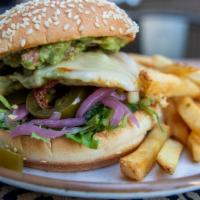 Southwest Chicken Sandwich · grilled chicken, chihuahua, guacamole, pickled onions, jalapenos, chipotle aioli, sesame see...