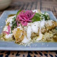 Chicken Enchiladas · Corn tortillas, avocado, cilantro, onions, queso fresco, and sour cream served with mexican ...