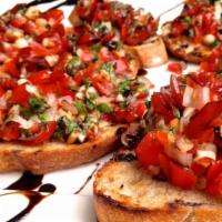 Bruschetta Crostini · Garlic Toast topped with diced Tomatoes, Onion, and Basil | finished with a Balsamic Demi-gl...