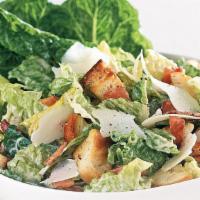Large Caesar Salad · Classic Caesar prepared with chilled romaine, topped with house-made croutons, shaved aged p...