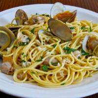 Clams Over Linguine · Fresh Little Neck Clams steamed open in-the-shell and sautéed in Mild 'n Tangy Marinara sauc...