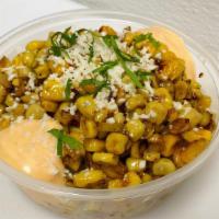 Charred Corn · with Rocoto Aioli, Queso Fresco, and Lime Zest
