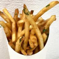 Crispy Fries · Papas Fritas: Shoestring Fries tossed in Rotisserrie Drippings, Herbs, and Spices (Not Veget...