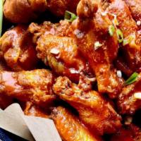 Wings  · Lost in the sauce of your choice: buffalo, teriyaki,
sweet chili, or habanero dry rub served...