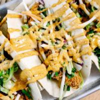 Fish Tacos · Crispy fried whitefish in flour tortillas, topped with corn salsa, shredded lettuce & drizzl...