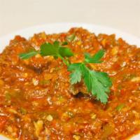 Spicy Vegetables · A mixture of chopped tomatoes and chili pepper, red pepper, onion, spices and walnuts, olive...