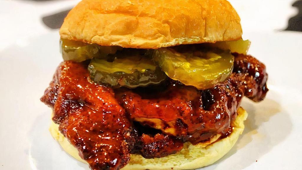 Nashville Sandwich · nashville-style hot crispy chicken, pickles, & mayonnaise