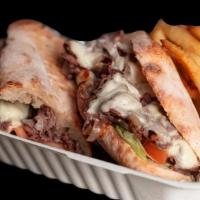 Steak& Cheese · Steak with caramelized onions, lettuce, tomatoes, mayonnaise with american Cheese in a fresh...