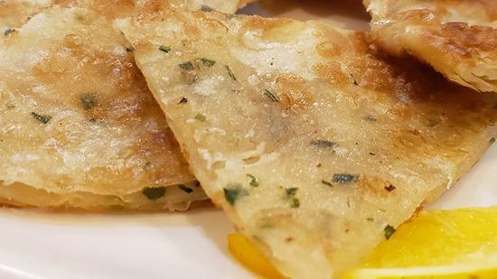 Scallion Pancake 葱油餅 · Vegetarian. Pan fried green onion pancake.