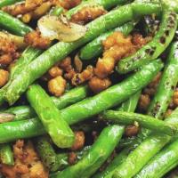 Sauteed String Bean With Mince Pork 干煸四季豆 · String bean & round pork stir-fried with ginger, garlic and chills.
