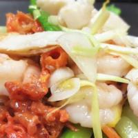 Seafood In Flower Basket · Lobster meat, jumbo shrimp, scallops, squid, fish paste with fresh vegetables sautéed with g...