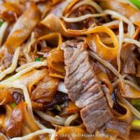 Beef Chow Fan (Dry) · Beef and wide noodle stir-fried with scallions, onion, ginger, bean sprouts in supreme soy s...