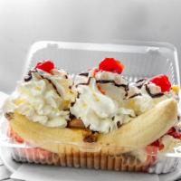 Traditional Banana Split Sundae With Custard Ice Cream · Choice of 3 flavored ice cream, comes with strawberries, pineapples, wet walnuts, chocolate ...