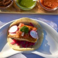Taco De Pescado · Grilled fish, pickled cabbage, pico de gallo, chipotle cream.