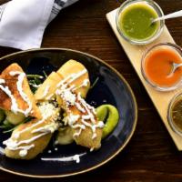 Quesadillas · Corn Tortilla, Melted Cheese Choice of: Roasted Poblano Peppers,Chicken Tinga, Pork Cochinit...