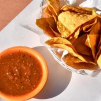 Corn Tortilla Chips & Roasted Salsa Fresca · Vegetarian. Corn tortillas are made in house daily.
