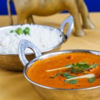 Butter Chicken · Chicken thigh cooked in a creamy tomato sauce.