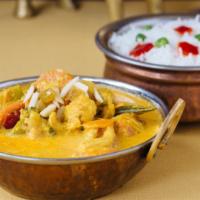 Chicken Korma · Chicken breast cooked in onion tomato and creamy cashew sauce.