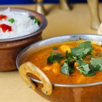 Goan Shrimp Curry · Shrimp cooked with fresh coconut, onion and tomato sauce in light cream.