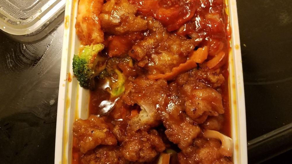 Dragon & Phoenix · Hot and spicy with jumbo shrimp on one side and general chicken on the other.