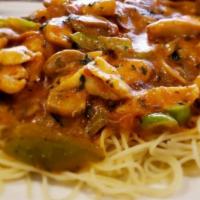 Angel Hair Basil Bolognese · Artichoke hearts, mushrooms, green peppers, fresh basil and garlic in Bolognese sauce over a...