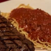 New York Steak* · Served with spaghetti meat sauce.

Black Angus, closely trimmed, seasoned and charbroiled to...
