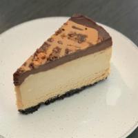 Kastle’S Kreations Peanut Butter Pie · Oreo cookie crust and a rich peanut butter center topped with chocolate ganache, crushed But...