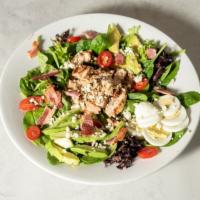 Cobb Salad · Mixed greens, bacon, avocado, Gorgonzola, grape tomatoes, hard boiled egg, and grilled chick...