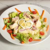 Chef Salad · Our garden salad topped with turkey, imported ham, provolone, hard boiled egg.