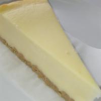 New York Cheesecake · Creamy New York Cheesecake slice