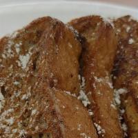 French Toast Please · THICK CUT TEXAS TOAST DIPPED IN CINNAMON SWEETNESS AND SPRINKLED WITH POWDERED SUGAR.
