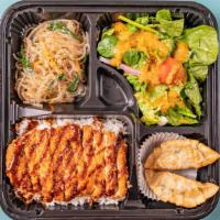 Chicken Katsu Bento Box · chicken cutlet,  rice, glass noodles, dumplings and salad