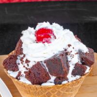Brownie Bite Specialty Sundaes · Brownie bites, hot fudge, whip cream, and cherry