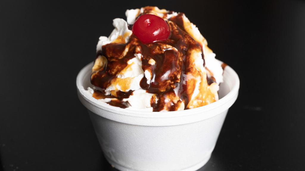 Create Your Own Regular Sundae · 2 scoops of ice cream, 1 topping, whipped cream and a cherry.