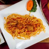 Spaghetti Con Carne · Marinara sauce with meatballs over spaghetti.