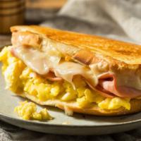 Pork, Egg & Cheese Sandwich · Large Breakfast sandwich made with Pork, melted cheese, and 2 eggs. Served on a Brioche bun.