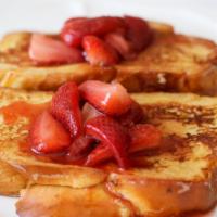 Breakfast Platter With Strawberry
French Toast · 2 pieces of Delicious French Toast topped with fresh strawberries, served with 2 eggs prepar...