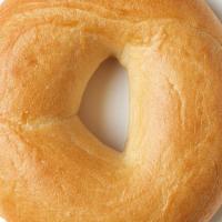 Plain Bagel · A Delicious plain bagel, served toasted.