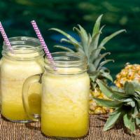 Orange Pineapple Juice · Juice made with fresh oranges and pineapples.