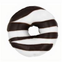 Black And White · Vanilla icing and chocolate drizzle.