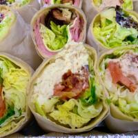Portfolio Tuna Salad Wrap · Our delicious homemade tuna salad, American cheese, lettuce, tomatoes and bacon. Served in y...