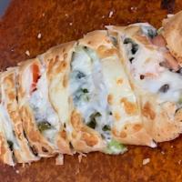Steak Bomb Calzone · Tender slices of steak, sauteed mushrooms, onions and peppers topped with our 3 cheese blend.